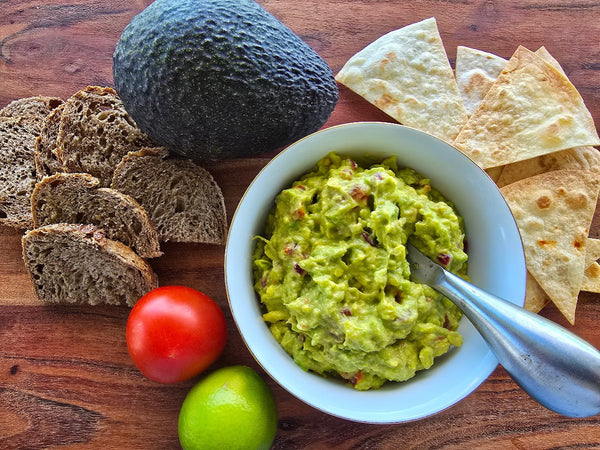 Fresh Lime and Chilli Guacamole-with tomato and red onion.
